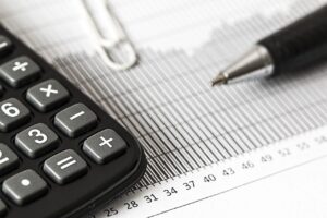 new year, calculator, calculation, insurance, finance, accounting, pen, investment, office, work, taxes, business, graphs, money, financial, tax, analysis, planning, return, income, economy, paperwork